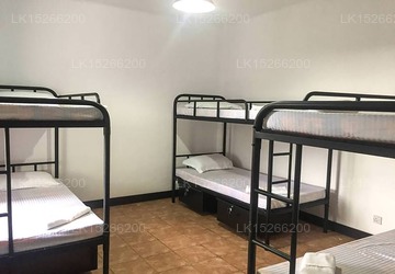 Single Bed In Dormitory Room